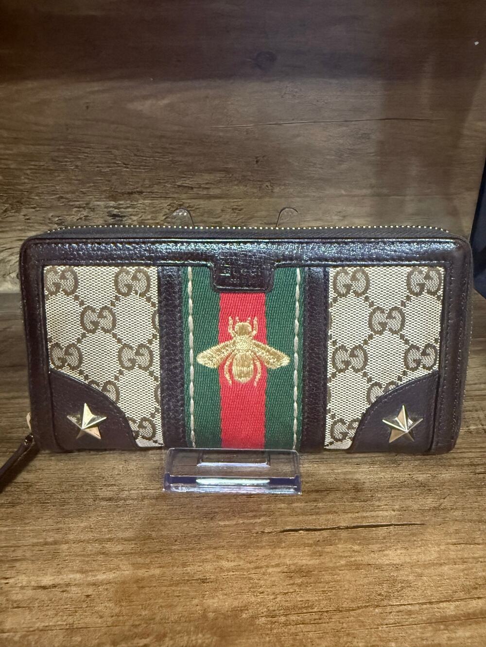 Gucci Monogram Sherry Web Rania Bee & Star Zip-Around wallet.